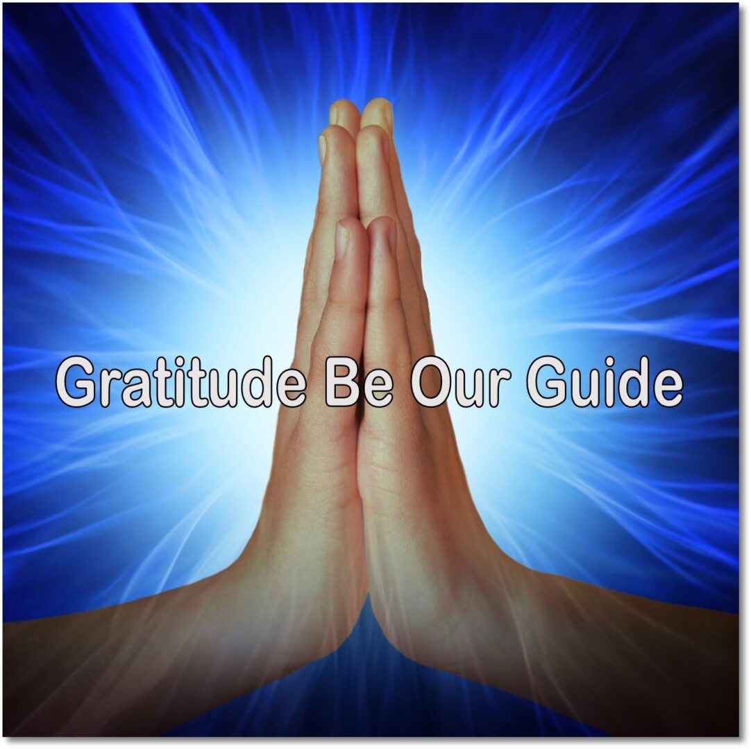 A person is praying with the words gratitude be our guide